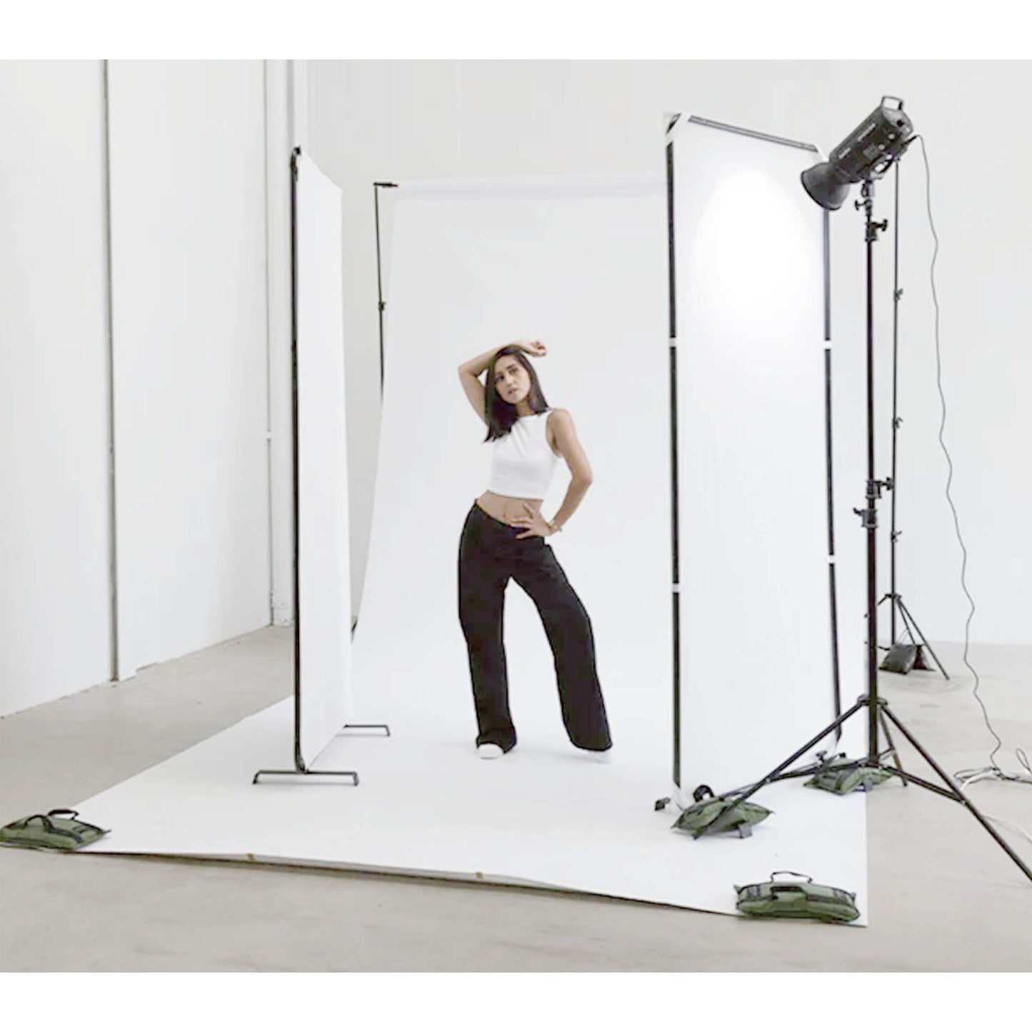 Free-Standing Reflector Panels being used on a photoshoot with model