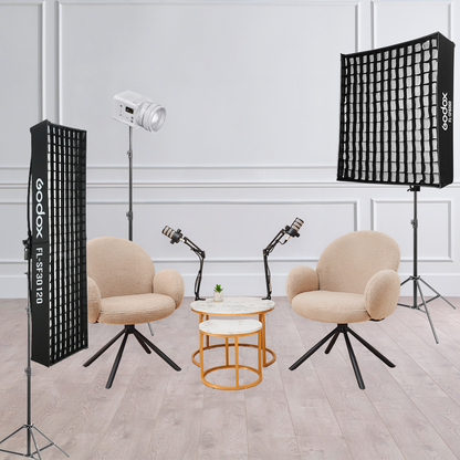 C-151991 Interview Kit Scene with chairs and microphones. Kit includes: 1 ML80Bi, 1x FlL150, 1x FL150S, and 3 Pixapro 240cm Light Stands