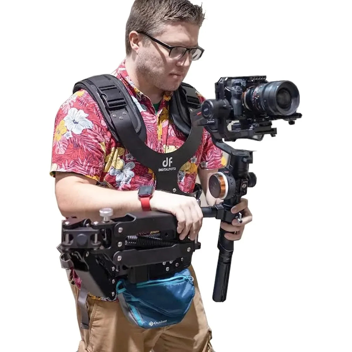 Man holding a DigitalFoto THANOS PROCII  camera with a stabiliser on a white background