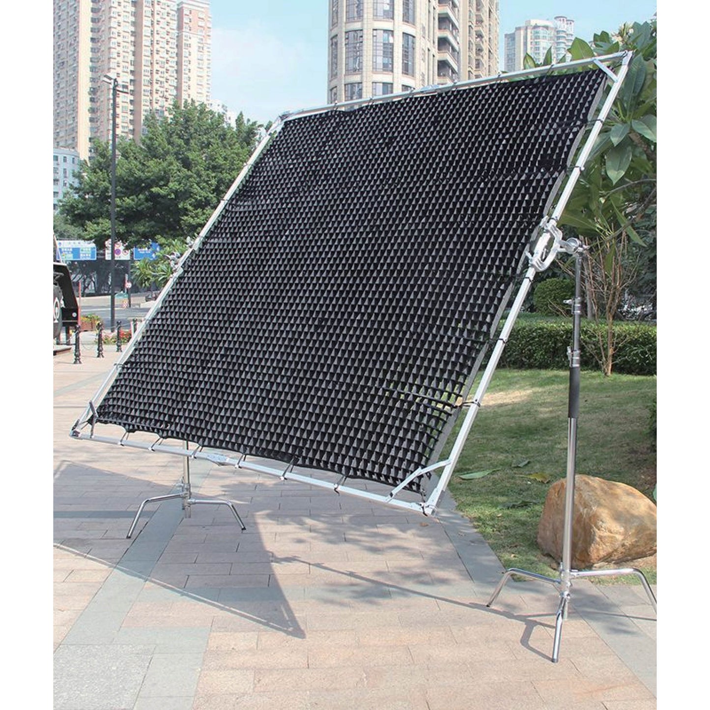 PiXAPRO 4x4cm Soft Grid for 240x240cm Butterfly Frame Scrim Diffuser being used outdoors