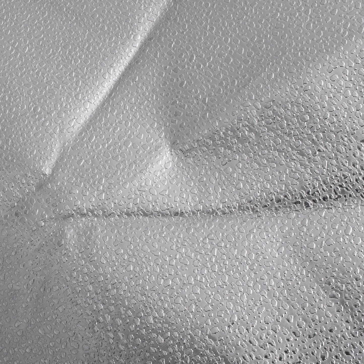 The Pixapro 60x150cm Flatpak Eyelighter Close up silver surface