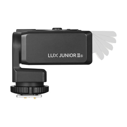 Godox Lux Junior II flash showing the range of tile motion thet flash head has