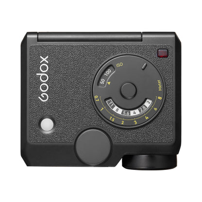 Godox Lux Junior II flash shown on a clean white background (Top view)