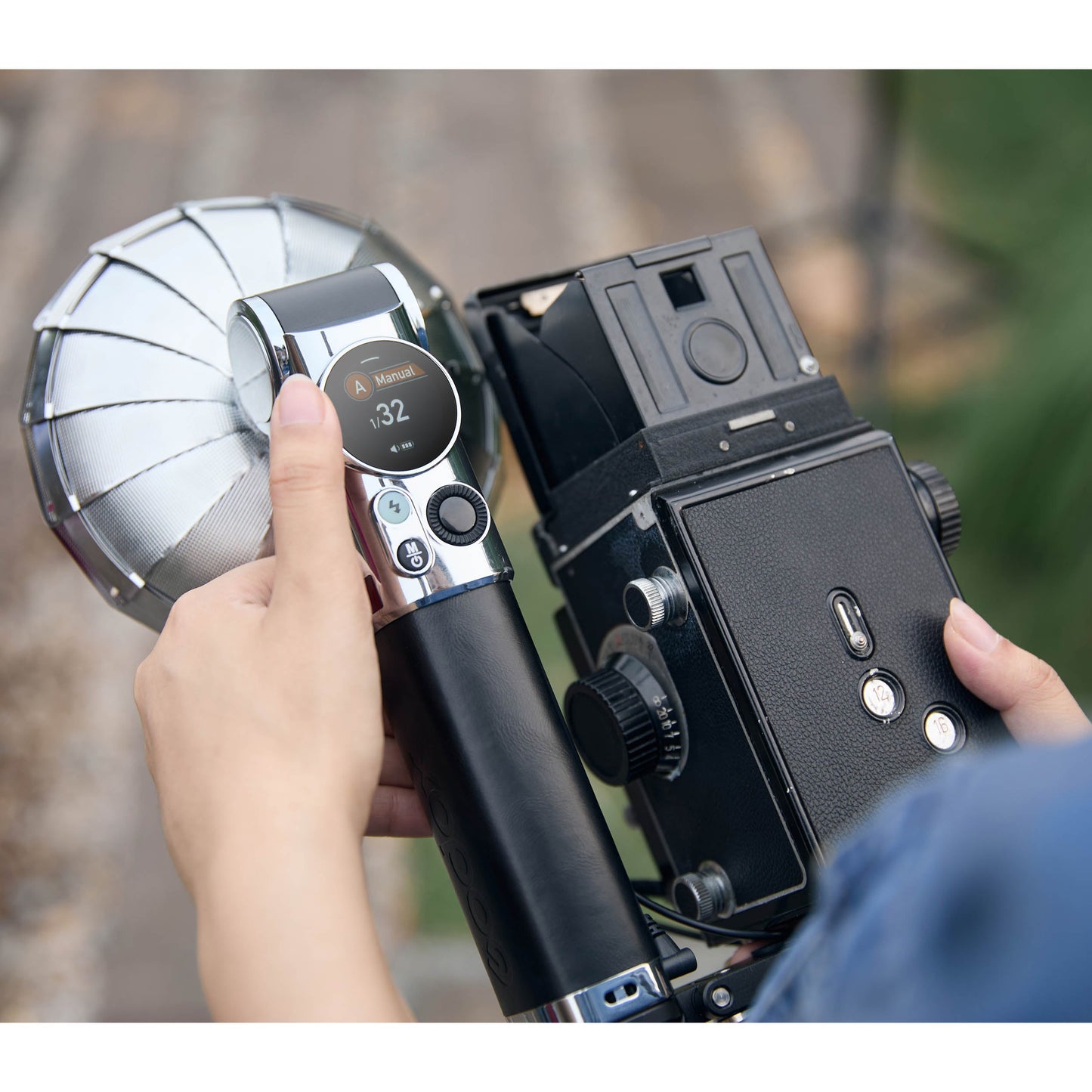 A rear view of the LUX Master connected to an old Twin Lens Reflex Camera
