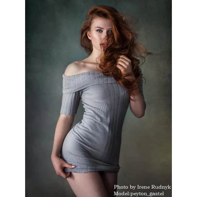 A woman in a grey off-shoulder dress posing against a 2x3 Abstract Rusty Texture Studio Photography Background by Kate Backdrops