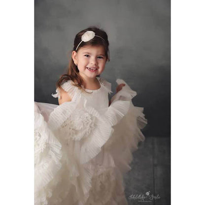 Young girl in a white dress with ruffles against a 2x3 Cold Tones Of Grey And Little Green Light Abstract Textured Studio Photography Background From Kate Backdrops