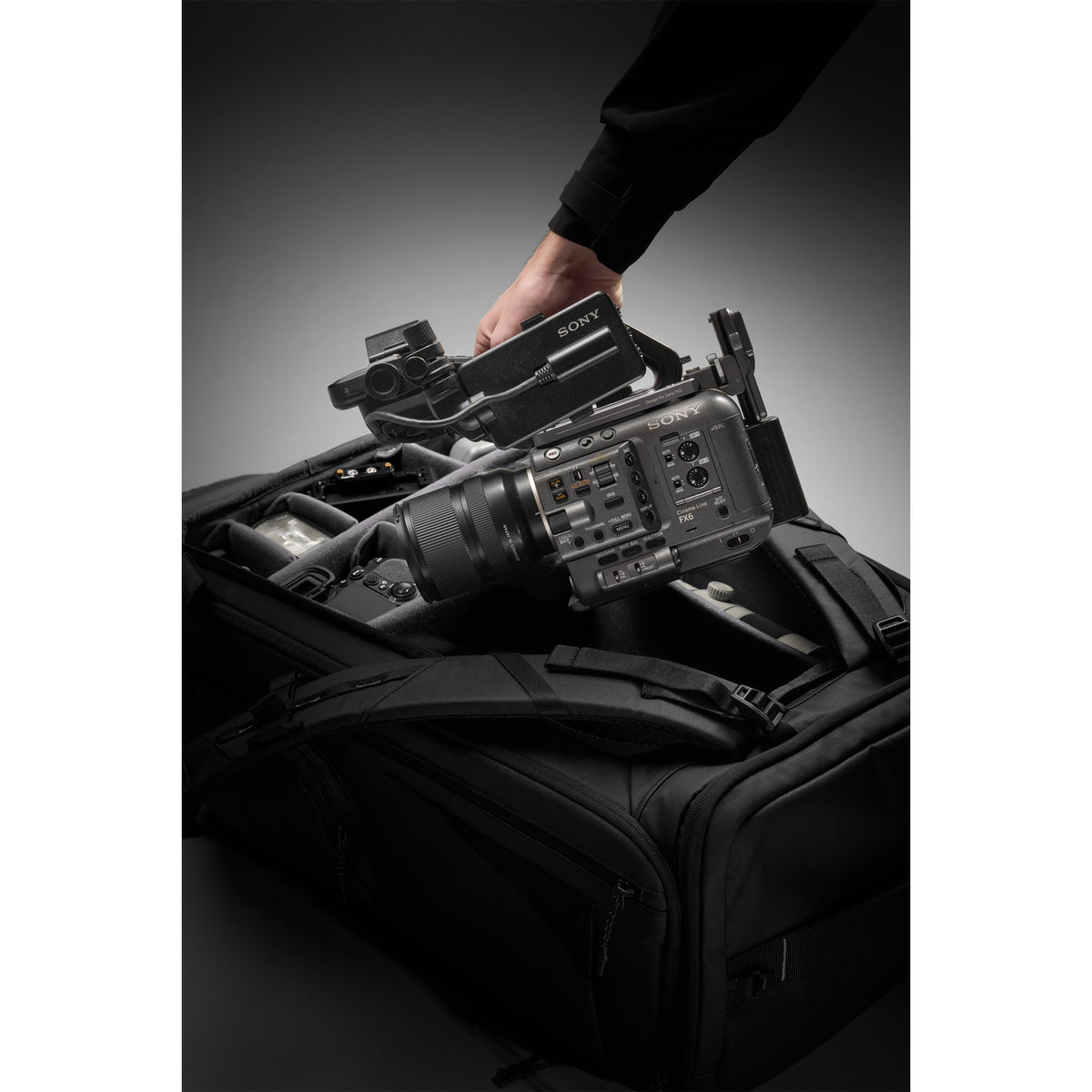 SAKK GEAR Sakk Pack V2 Photographer removing camera from interior of bag